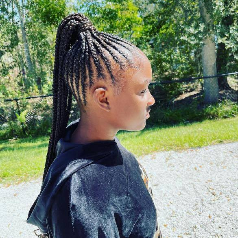 Young girl with braided ponytail